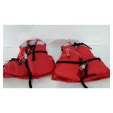 Two of Shore life vests, adult size with beacons