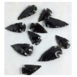 10 black arrowheads