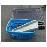 Group of window screens, laundry basket and a