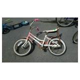 Pink lighting youth bike shows wear