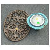 Light and a cast iron decor piece
