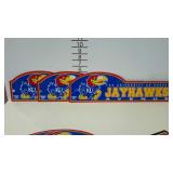 Three University of Kansas JAYHAWKS plastic