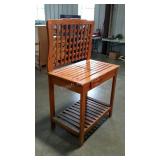 Gardening work bench with soil pan and drawer.