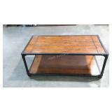 Two tiered contemporary coffee table on wheels.