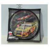 Battery powered clock, new in box.  NASCAR, JUAN