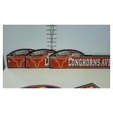 Three University of Texas Longhorns plastic