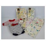 Infant clothes, still with tags