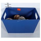 12 used baseballs in poly storage box.