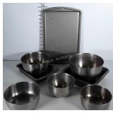 Metal baking dishes plus several small stainless