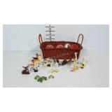 Ceramic figurines, painted eggs and a glass chick