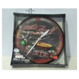Battery powered clock, new in box.  NASCAR, BASS