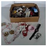 Box of misc costume jewelry: necklaces,