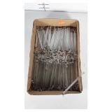 Box of long thin prisms. About 8 inches long.