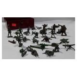 Toy soldiers, one metal and the rest plastic,