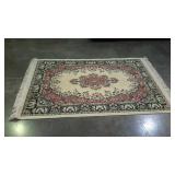 Area rug with floral patterned border, ivory