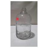 Old Maid Whiskey Distillers Jug, one gallon clear
