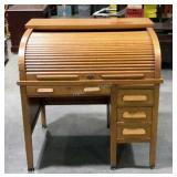 Oak roll top desk. Will need some restoration but