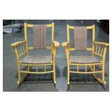 Pair of painted porch rockers with woven seats