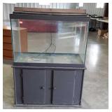 Fish aquarium with stand, tank measures 36  by 18