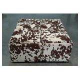 Large storage ottoman with four storage cubes.