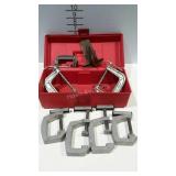 Small tool tote of assorted clamps.