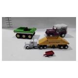 3 Tonka toys and one Ertle wagon
