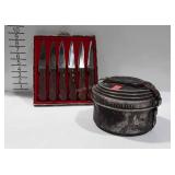 Camping cookstove and wooden handle knives, both