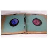 Album with eleven 78 records.