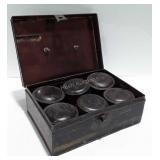 Metal box with 6 storage cans and a few ammo