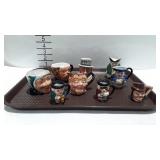 England and Staffordshire Toby cups and creamers,