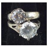 2 CZ Solitaire Style Rings 8.9, grams , size Both