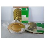 8 Decorative gold chargers in original boxes.