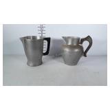 Hammered aluminum pitchers.