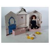 Madeline Doll with carry along wardrobe and a few