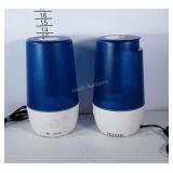 Two Pure Guardian humidifiers. Both light up and