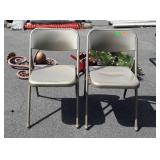 2 metal folding chairs