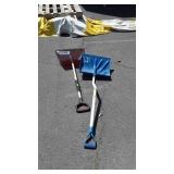 Two poly Snow shovels