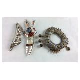 Three brooches one is marked sterling