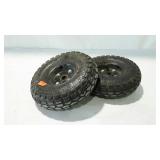 Pair of 4.10/3.50-4 tires on wheels. Nylon tube