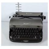 Remington Rand typewriter.  Buttons appear to