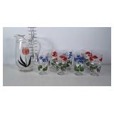 Seven 12oz glass floral tumblers and a