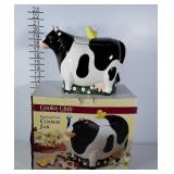 Cow cookie jar. Chip on bottom of foot and