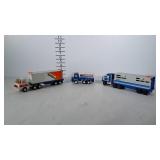 3 older Tonka Truck toys.