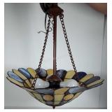 Slag glass ceiling light fixture, has a crack as