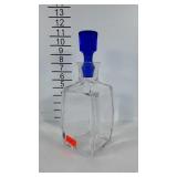 Crystal decanter with cobalt blue stopper