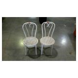 Two bent wood chairs with rattan seats. Painted