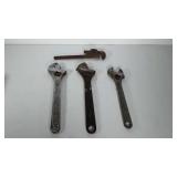 Three crescent wrenches, two 18" and a 15", plus