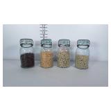 4 quart sized canning jars marked "Trademark