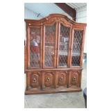 DREXEL two piece lighted china cabinet. Glass
