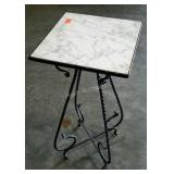 Wrought iron plant stand with marble top. 12"